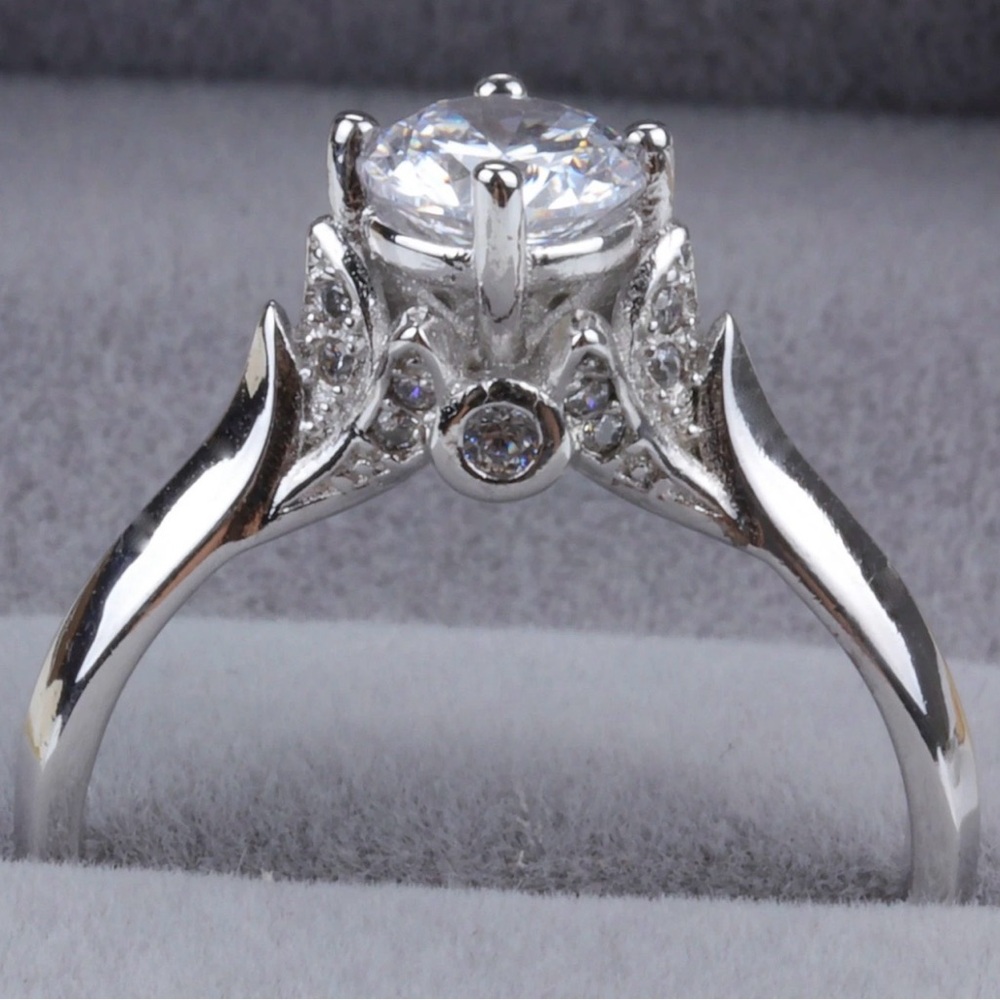Elegant Silver plated Ring with Clear Gemstones